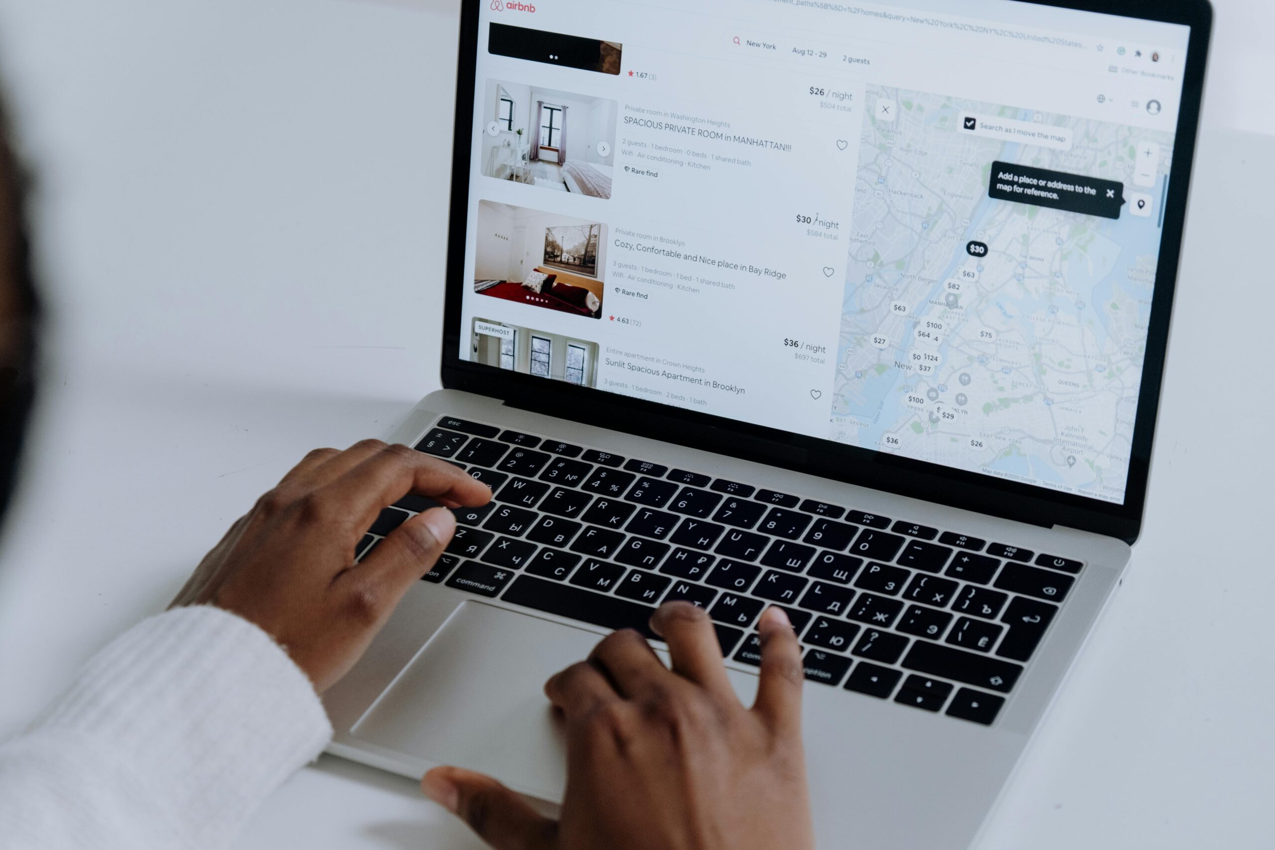 Screenshot showing vacation rental search results on Airbnb featuring medieval-themed homes
