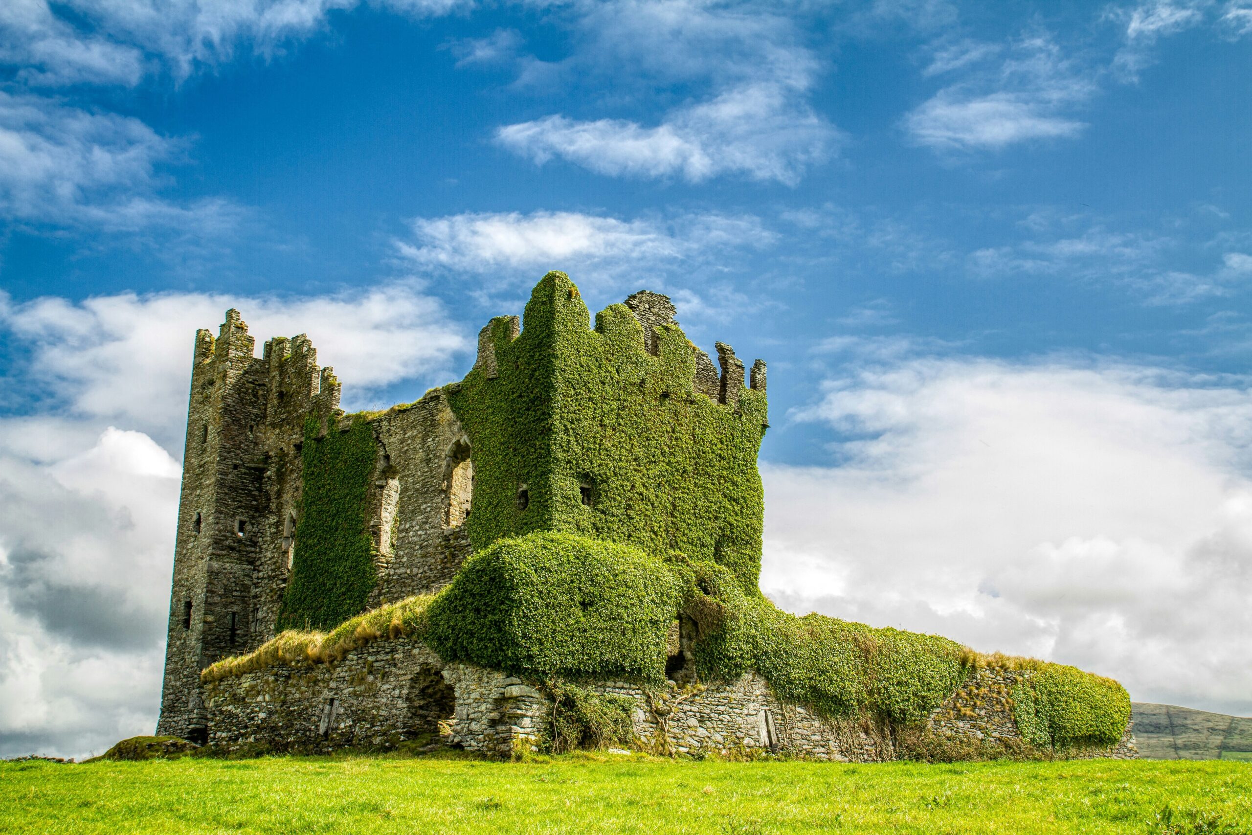 A fairy-tale-worthy medieval castle in Ireland overlooking lush green hills