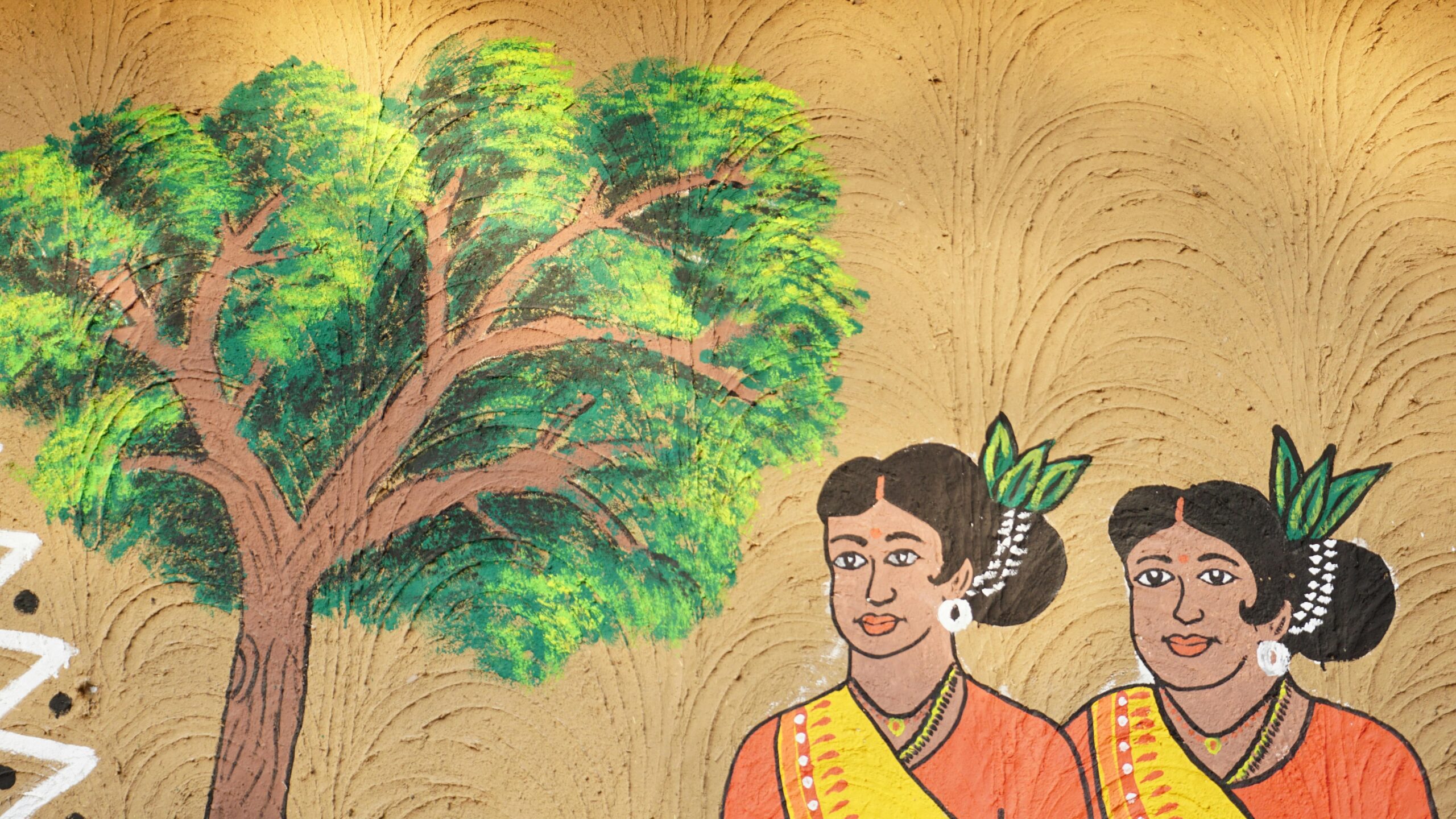 A vibrant mural showcasing traditional symbols and motifs representing indigenous culture.