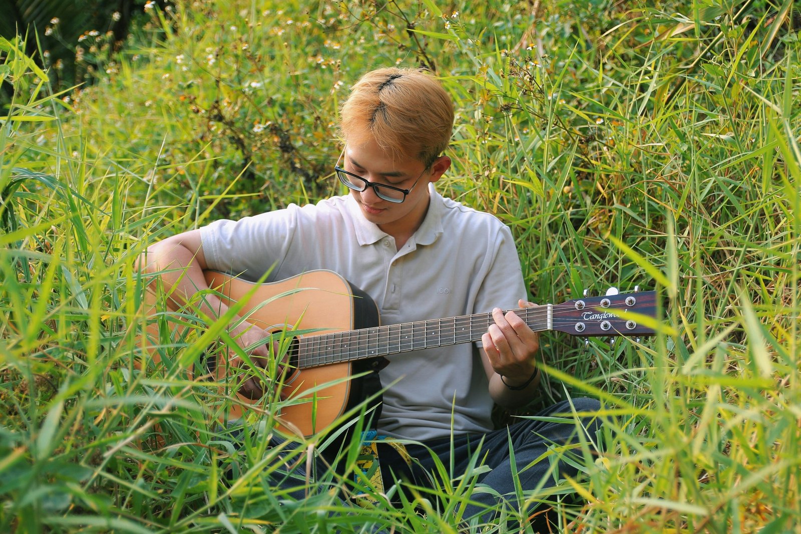 A classical musician playing violin inside a historic mansion