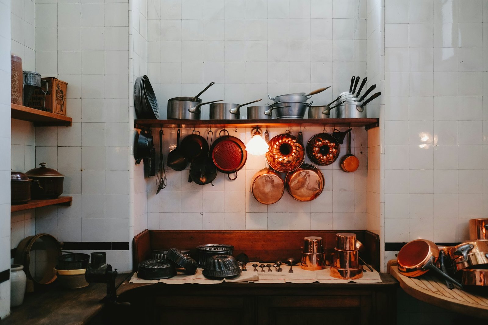 Interior of a historic cabin featuring a pink retro refrigerator