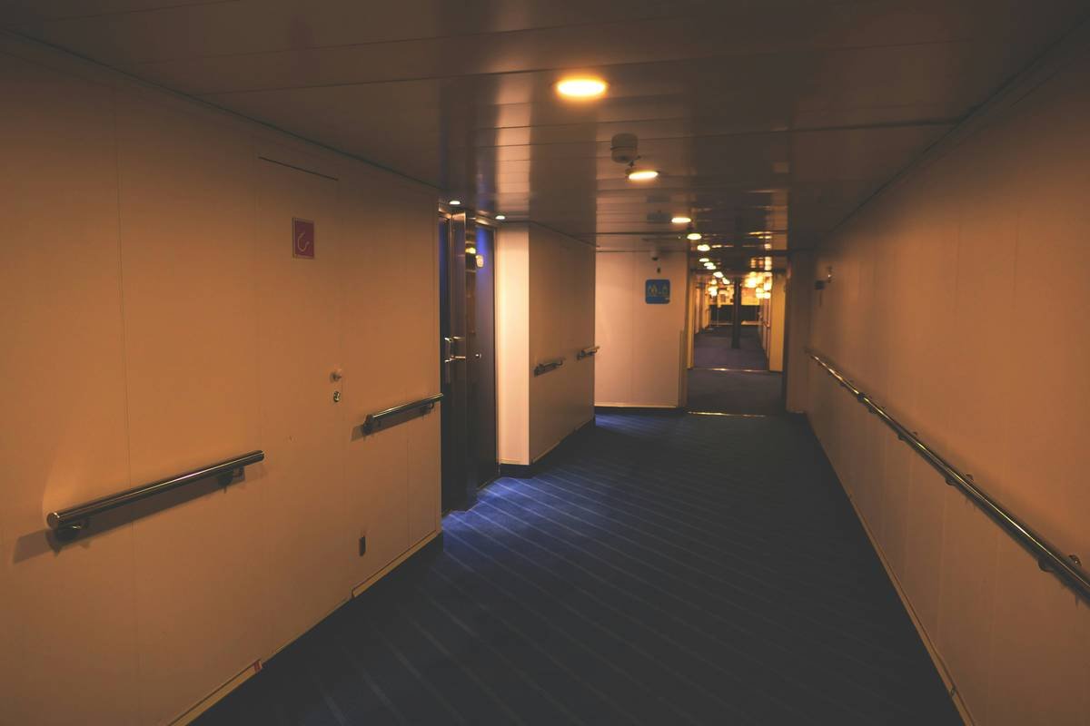 A cozy interior of a restored 16th-century cottage with wooden beams