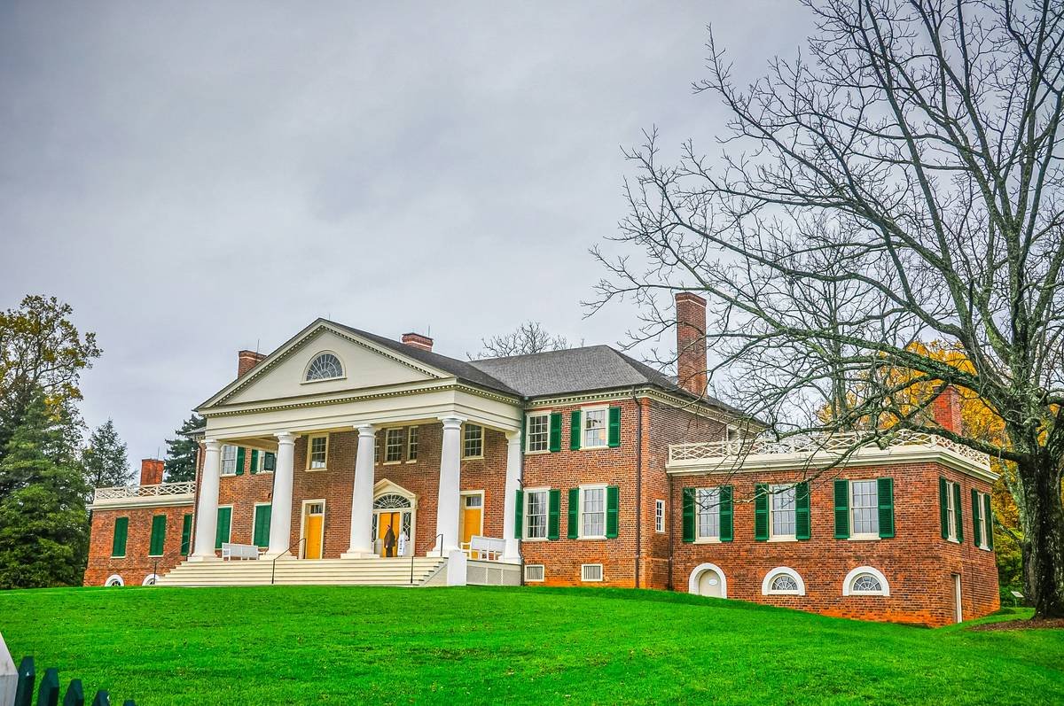 A historic castle transformed into a vacation rental, featuring grand architecture and lush gardens.