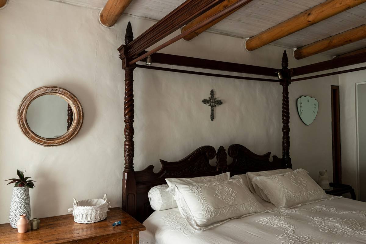 A warm fireplace inside a rustic heritage lodge during winter