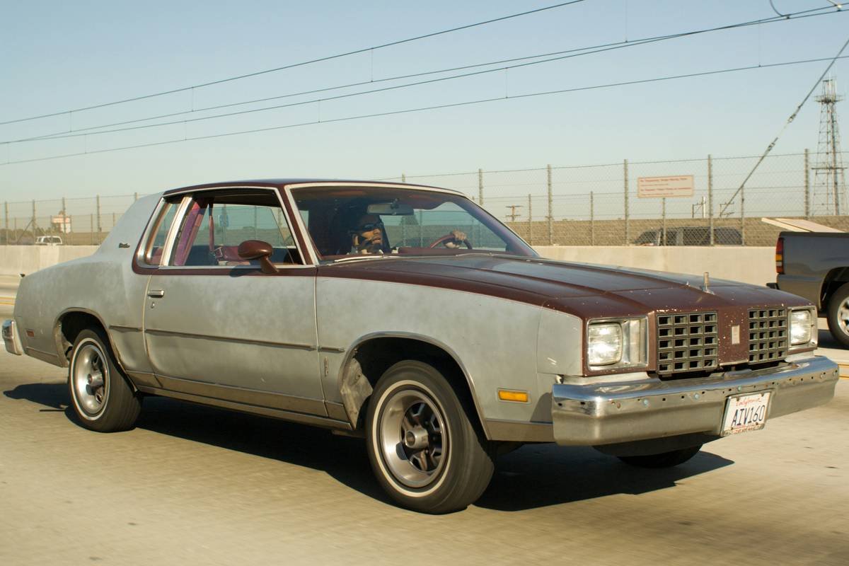 Cozy interior of a charming old-timey home filled with vintage furniture and warm lighting.