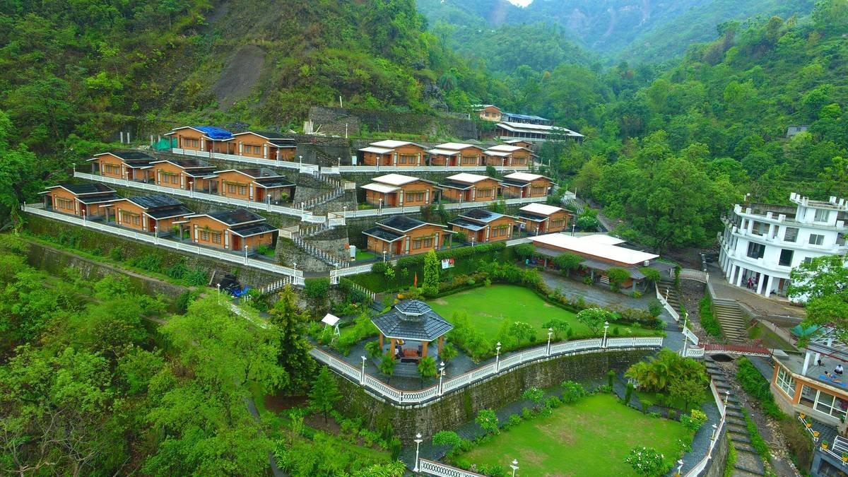 A traveler browsing online listings for heritage lodge rent options