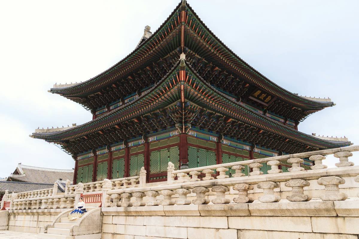 A vibrant cobblestone street surrounded by ancient buildings in a culture historic center