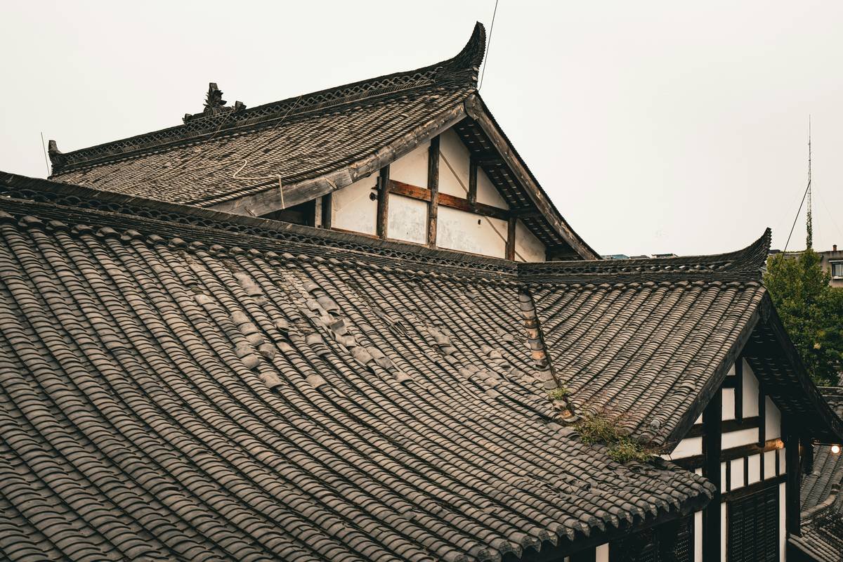 Cozy interior of a historic vacation rental with wooden beams and antique decor