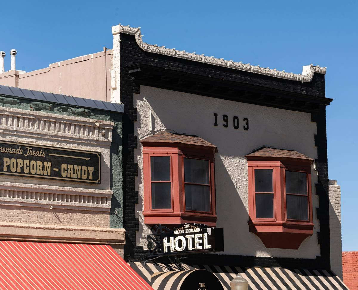Luxurious interior of a renovated heritage hotel with wooden beams and antique furniture