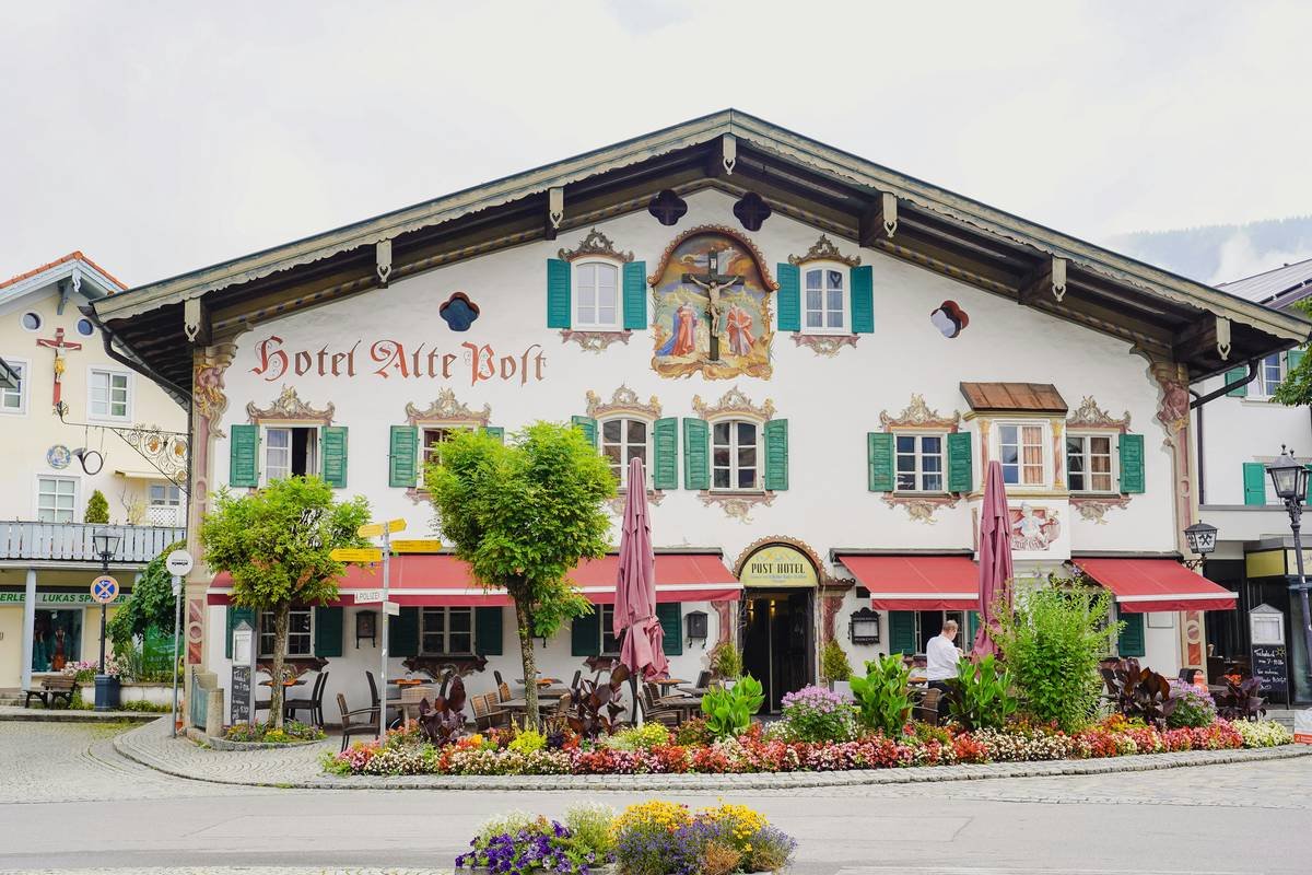 Side-by-side comparison: left shows generic 'historic-looking' Airbnb with staged decor; right shows authentic cultural base rental with original architecture, local artifacts, and host interaction