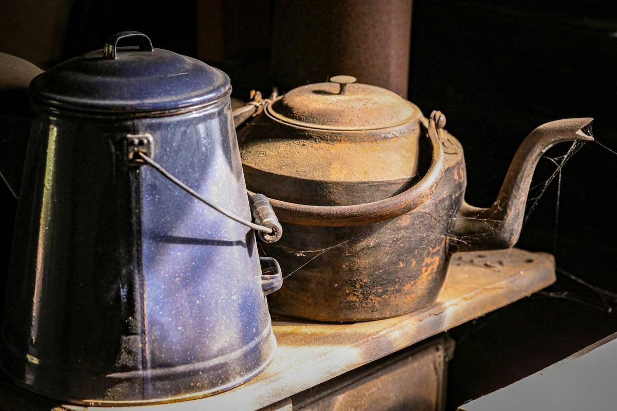Antique kitchen pots at a living history pioneer village.